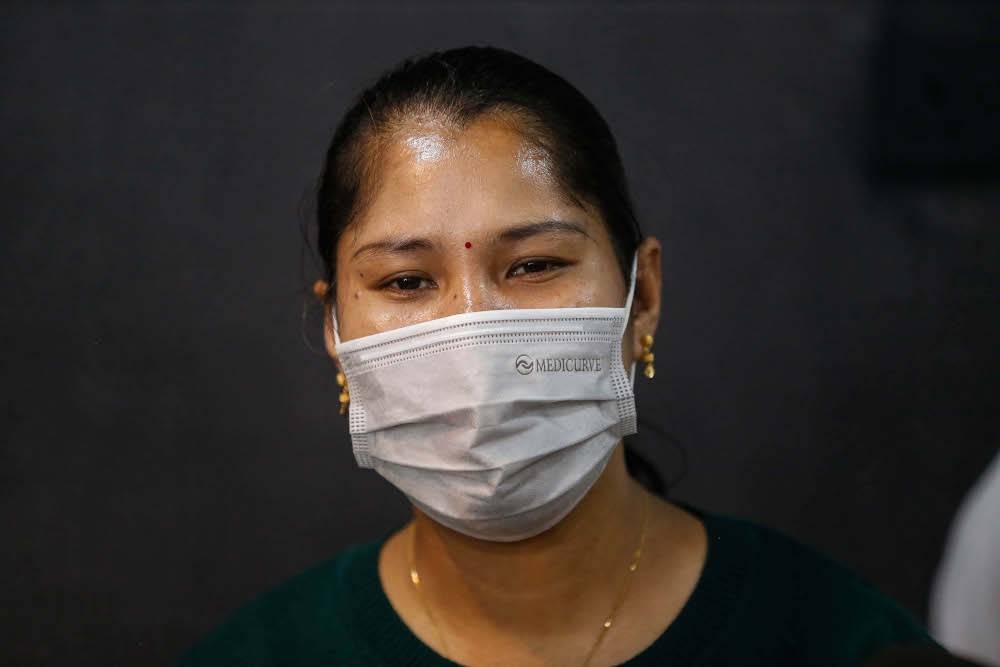 罗秀虹周三获准探望3名孩子，全程一小时。-马新社-