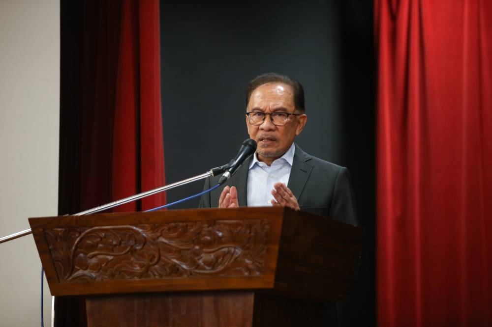 安华表示，希盟主席理事会将尽快商议MUDA申请加入一事。-Ahmad Zamzahuri摄-