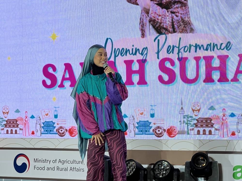 主办方更请来马来女歌手萨拉献唱。-庄礼文摄-