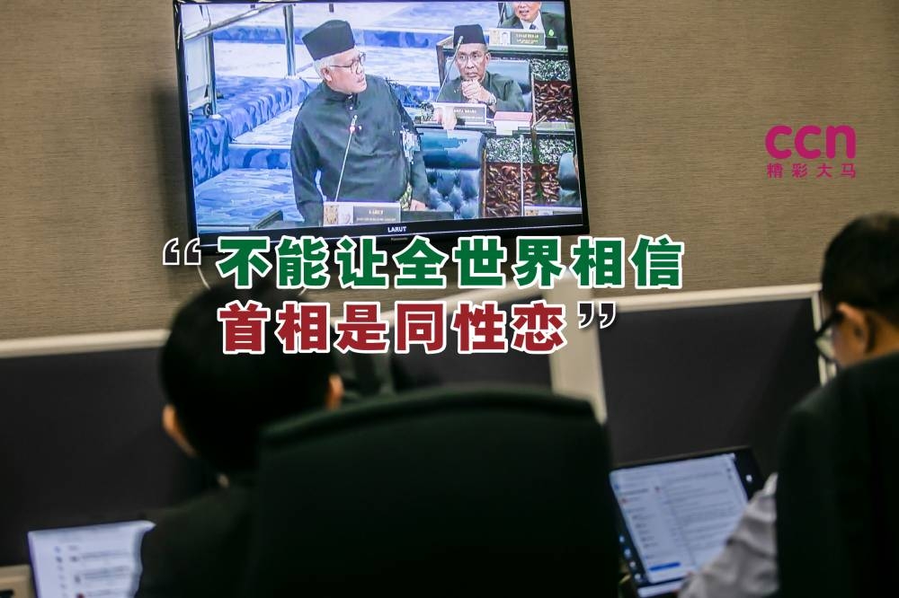 韩查说，安华不能再让全世界相信马来西亚的首相是一名同性恋。-Hari Anggara摄，精彩大马制图-