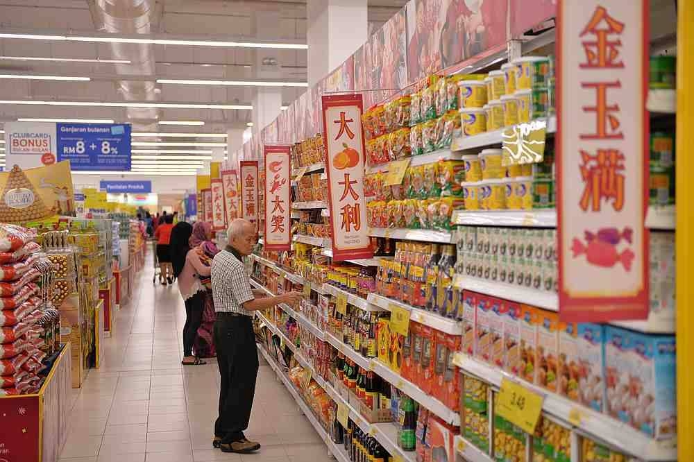 每年农历新年家家户户都会置办年货欢庆佳节。-图摘自Tesco Malaysia-