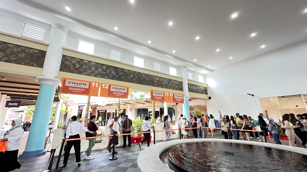 Coach Airways还设有专属柜台办理“登机”手续。-张晓真摄-