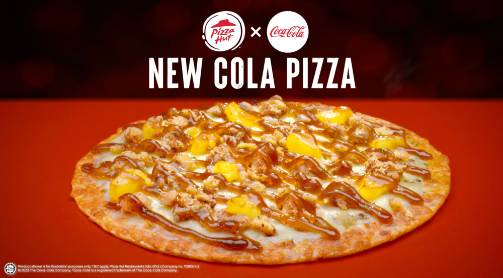 这款披萨只吃一口，就可以同时享受到两种味道。-大马Pizza Hut提供-