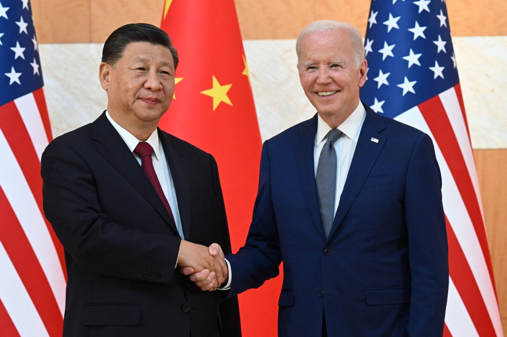 中国国家主席习近平（左）和美国总统拜登周三将在三藩市的费罗丽庄园会晤。双方将就一系列双边和全球议题进行大约4个小时的深入对话。-法新社-