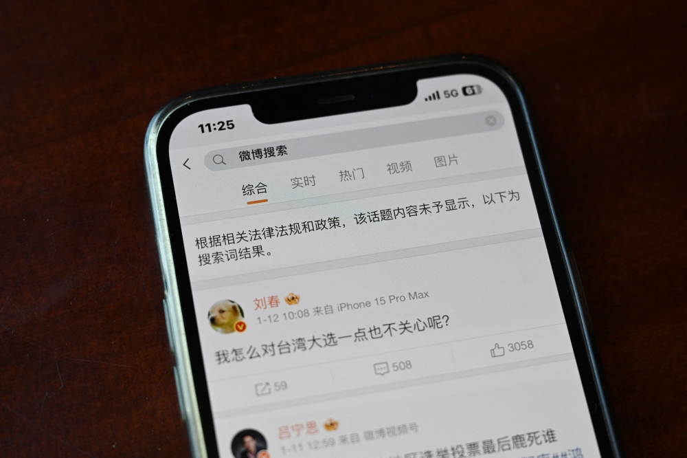 尽管之后微博恢复了台湾选举、台湾大选的标签，用户也可以看到若干关于台湾选举的讨论内容，但相关话题在热搜榜上的位置已向后。-法新社-