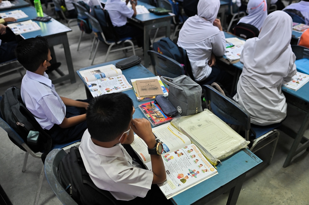 教育部保证一旦调整开学时间，学校课程纲要不会受到影响。-Miera Zulyana摄-