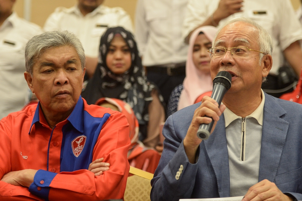 阿末扎希（左）说，他与纳吉不仅是上司与下属关系，也是亲如手足。-Mukhriz Hazim摄-