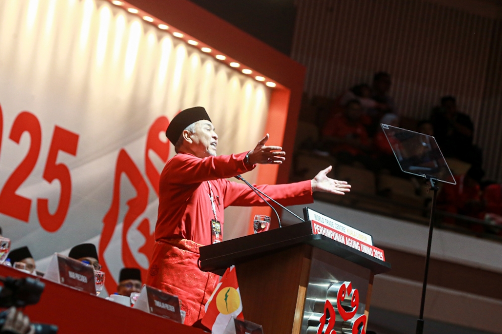 阿末扎希在巫统大会上，呼吁马华与国大党重回国阵怀抱。-SAYUTI ZAINUDIN摄-