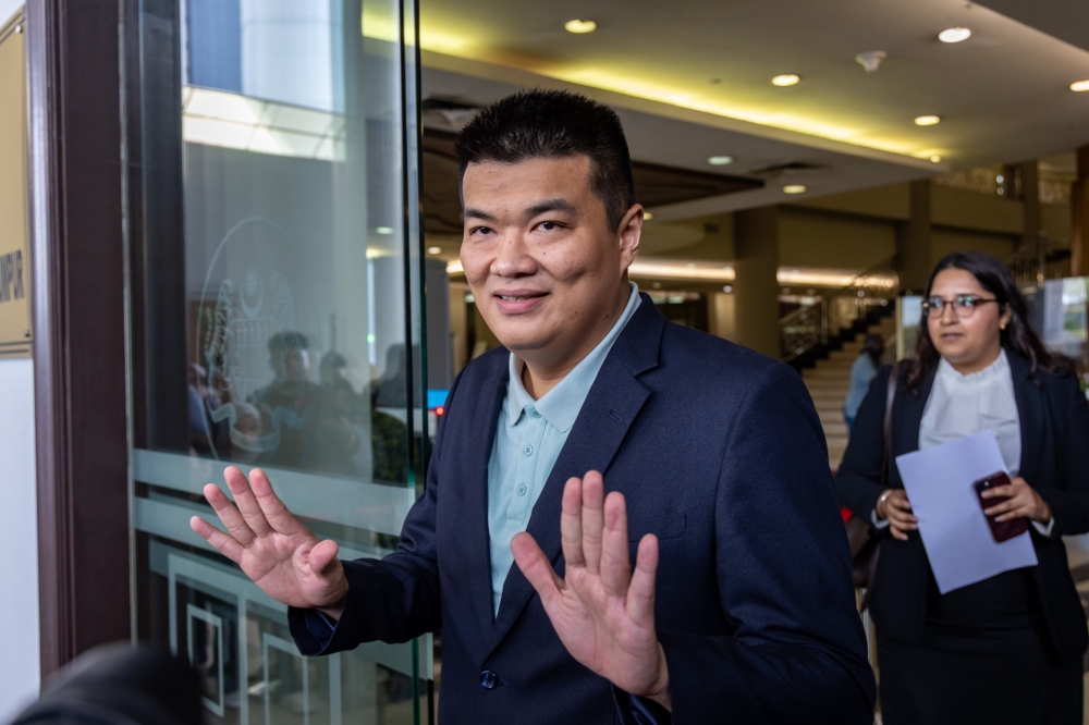 刁健城联合洪伟翔以及李伟康发动“人民自由发言集会”，抗议政府打压言论自由。-Firdaus Latif摄-