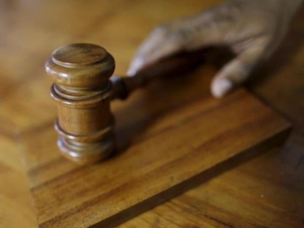 张庆益被控欺诈与受贿罪，案情涉及学校拨款以及智能白板供应合约。-路透社-