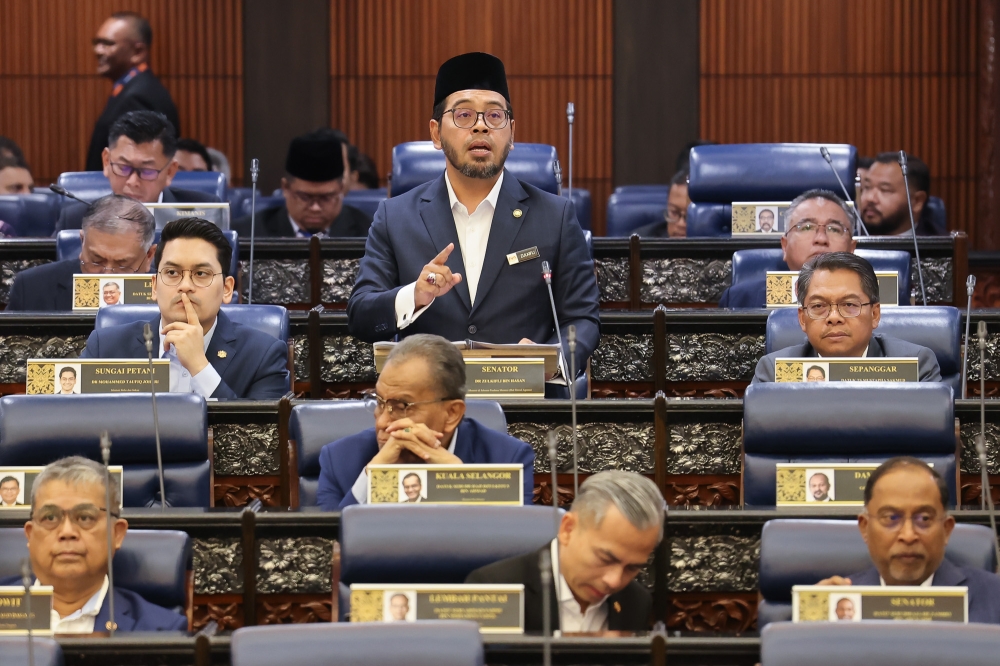 祖基菲利在下议院汇报朝圣局的财务状况与复苏计划。-Yusof Isa摄-