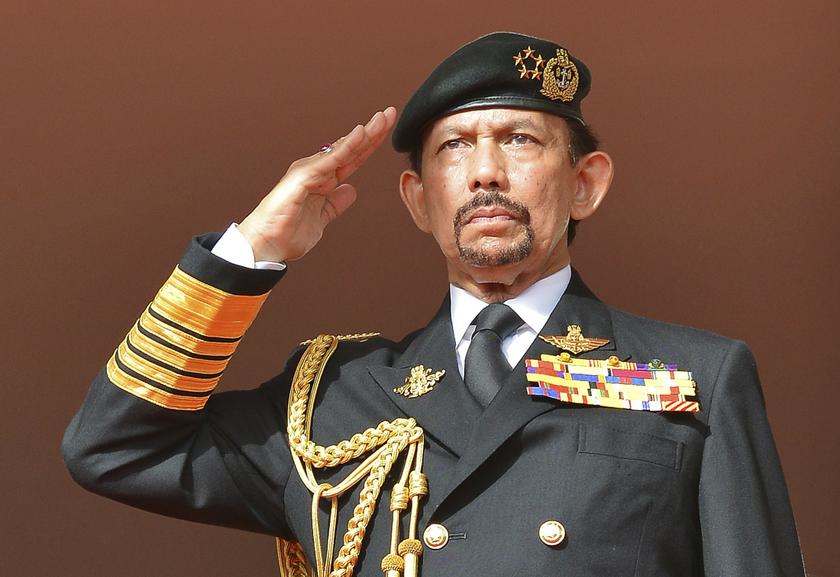Brunei's Sultan Hassanal Bolkiah salutes as the national anthem is played during celebrations for Brunei's 30th National Day, in Bandar Seri Begawan February 23, 2014. u00e2u20acu201d Reuters pic