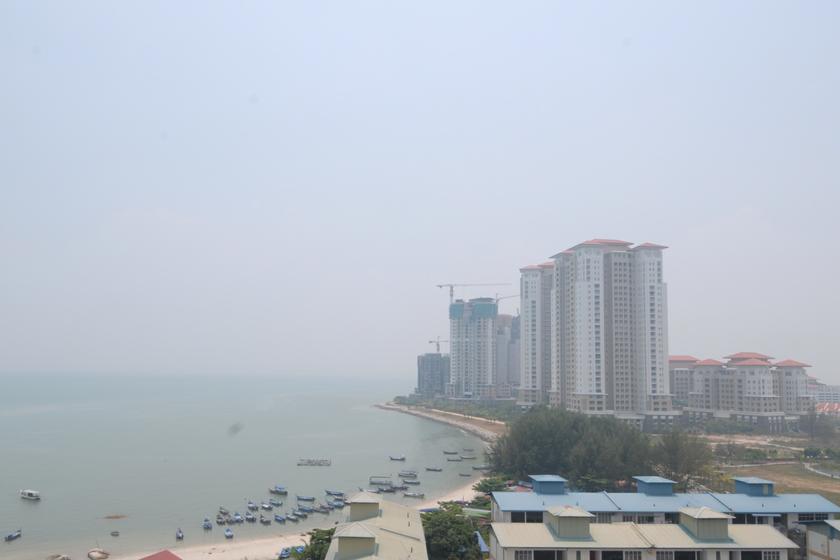 The coast off the island in the background (where the high rises are) is marked for the proposed Sri Tanjung Pinang II reclamation project that will cover 706 acres. u00e2u20acu201d Picture by K.E. Ooi