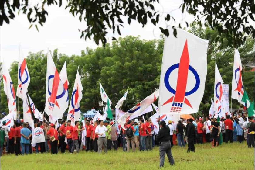 DAP flags seen on nomination day in Teluk Intan, May 19, 2014. u00e2u20acu201d Picture by Saw Siow Feng