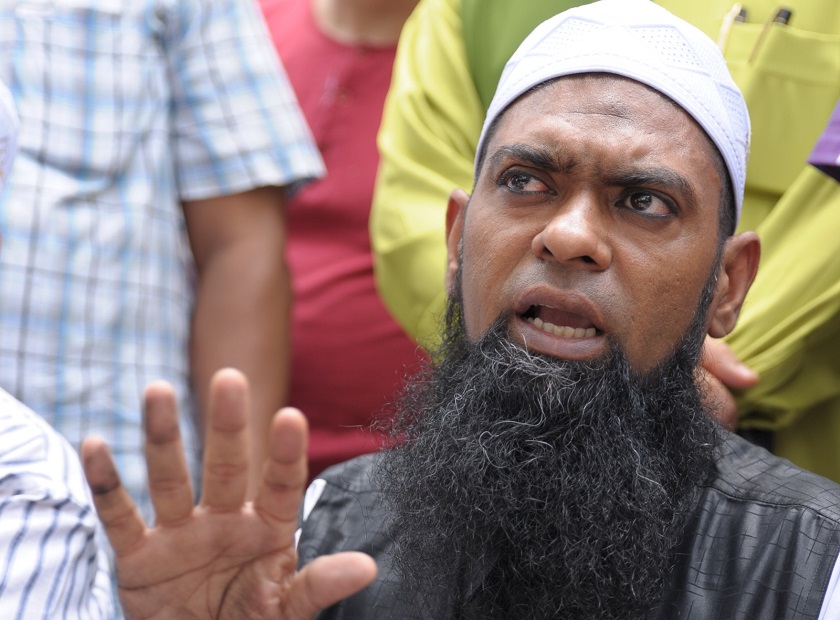 Ustaz Shahul Hamid (right) apologised over the offensive words he used during a religious speech and asked for a second chance to make amends. u00e2u20acu201d Picture by K.E. Ooi