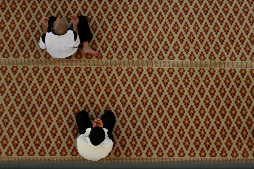 A man is seen reciting the doa after perform Friday prayers at the National Mosque in Kuala Lumpur, July 4, 2014. u00e2u20acu201d Picture by Yusof Mat Isa