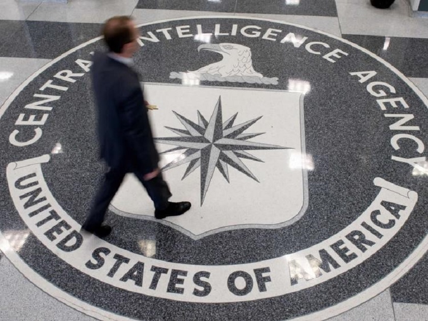 A man crosses the Central Intelligence Agency (CIA) logo in the lobby of CIA Headquarters in Langley, Virginia, on August 14, 2008. u00e2u20acu201d AFP pic