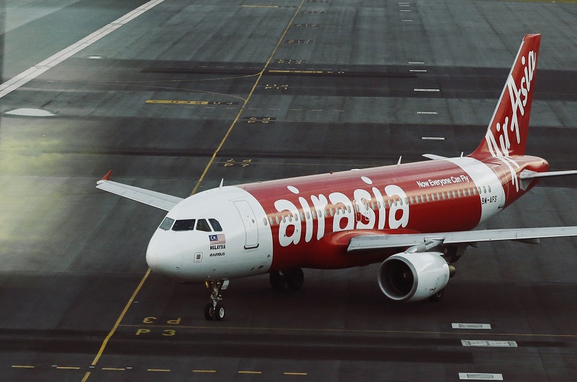 An AirAsia plane is seen on the runway at Kuala Lumpur International Airport August 19, 2014. u00e2u20acu201d Reuters pic