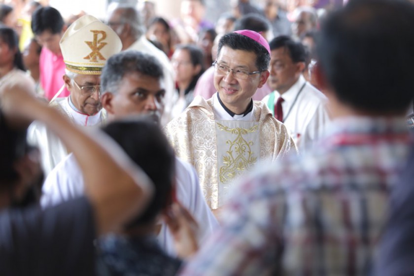 Father Julian Leow Beng Kim (centre) entering the Holy Family Church, Kajang, to be ordianed as Archbishop of Kuala Lumpur, October 6, 2014. u00e2u20acu201d Picture by Choo Choy May