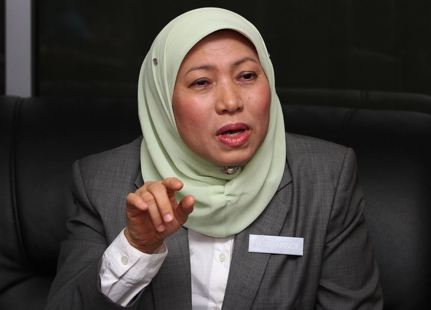 Minister in the Prime Minister's Department, Nancy Shukri speaks to the media during the launch of the 'Empowering Youth Information 2014' programme at the Department of Museums Malaysia Auditorium in Kuala Lumpur, October 21, 2014. u00e2u20acu2022 Picture by Yusof M