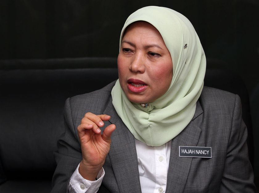 Minister in the Prime Minister's Department, Nancy Shukri speaks to the media during the launch of the 'Empowering Youth Information 2014' programme at the Department of Museums Malaysia Auditorium in Kuala Lumpur, October 21, 2014. u00e2u20acu2022 Picture by Yusof M