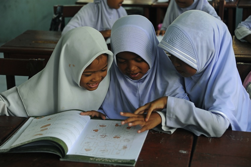 This picture taken on August 28, 2014 in Saiburi, in Thailand's restive southern province of Pattani, shows Muslim schoolchildren studying in their classroom at a religious school, where the Jawi language is taught.  u00e2u20acu201d AFP pic