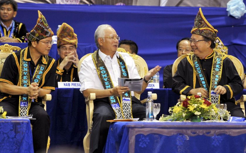 Datuk Seri Najib Razak has a discussion with Upko Deputy President Datuk Wilfred Madius Tangau (left) dan Upko President Tan Sri Bernard Dompok (right) at the Upko convention in Kota Kinabalu November 15, 2014. u00e2u20acu201d Bernama pic