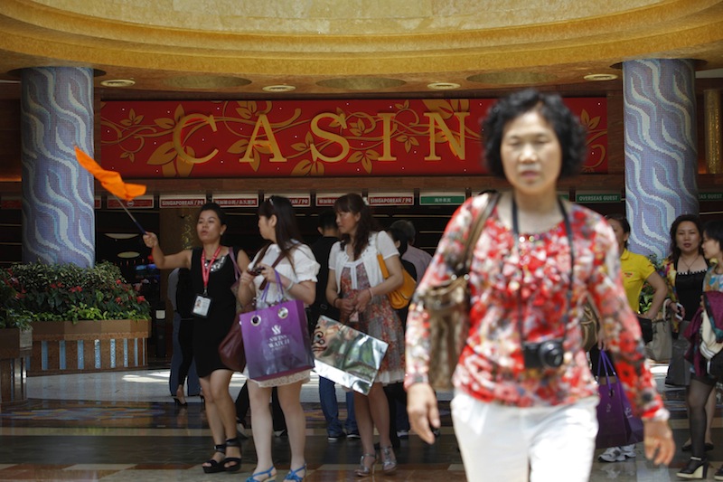Chinese tourists arrive at the lobby of Genting Singapore's Resorts World Sentosa casino in Singapore in this April 29, 2013 file photo. u00e2u20acu201d Reuters pic