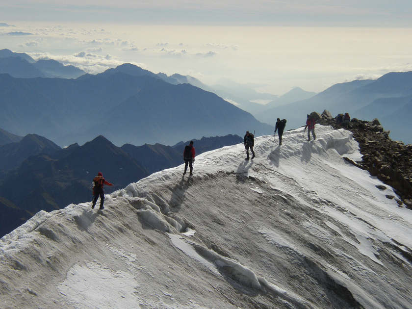 A group of climbers on the ridge of a mountain above 4000 metres in the Swiss Alps. An avalanche killed three Italians skiing in another part of the mountain range known as 'Death Valley' February 21, 2015. u00e2u20acu201d AFP pic