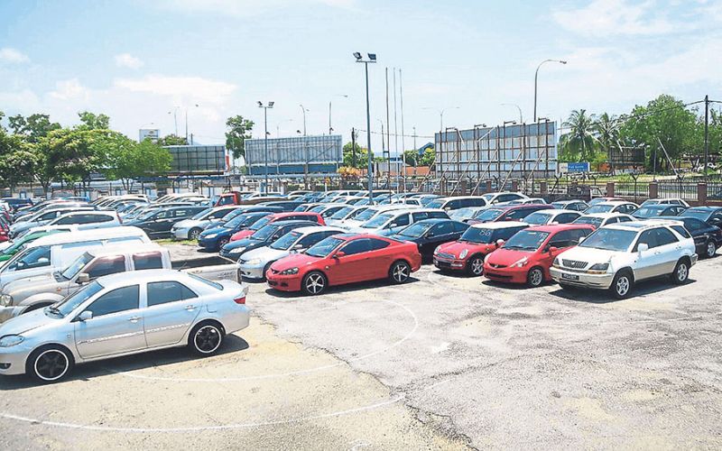 Some of the luxury cars seized during the operation. MACC is not discounting the possibility the syndicates have links in Singapore. u00e2u20acu2022 Malay Mail pic