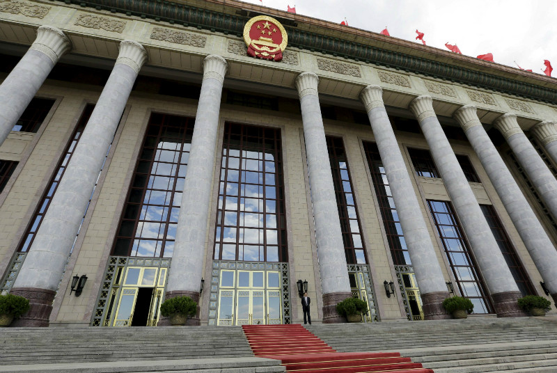 An officer stands outside the Great Hall of the People, the venue of National People's Congress, China's parliament, in Beijing, June 18, 2015. u00e2u20acu201d Reuters pic