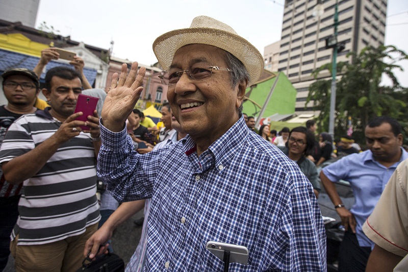 Former Prime Minister Tun Dr Mahathir Mohamad  (centre) waves as he attends a rally organised by pro-democracy group Bersih near Central Market in  Kuala Lumpur, August 30, 2015. u00e2u20acu201d Reuters pic