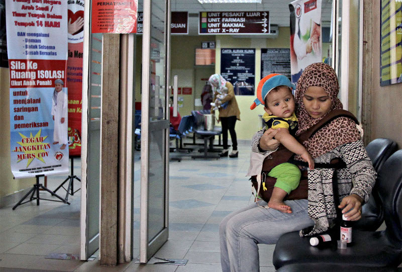 nA woman and her baby are pictured at the Maternal and Child Health clinic in Shah Alam. u00e2u20acu201d Picture by Yusof Mat Isa