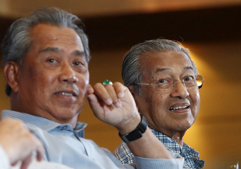 Former deputy prime minister Tan Sri Muhyiddin Yassin (left) and  former prime minister Tun Dr Mahathir Mohamad during the Kongress Rakyat 2016 forum organised by the Save Malaysia movement in Shah Alam March 27, 2016. u00e2u20acu201d Reuters pic 