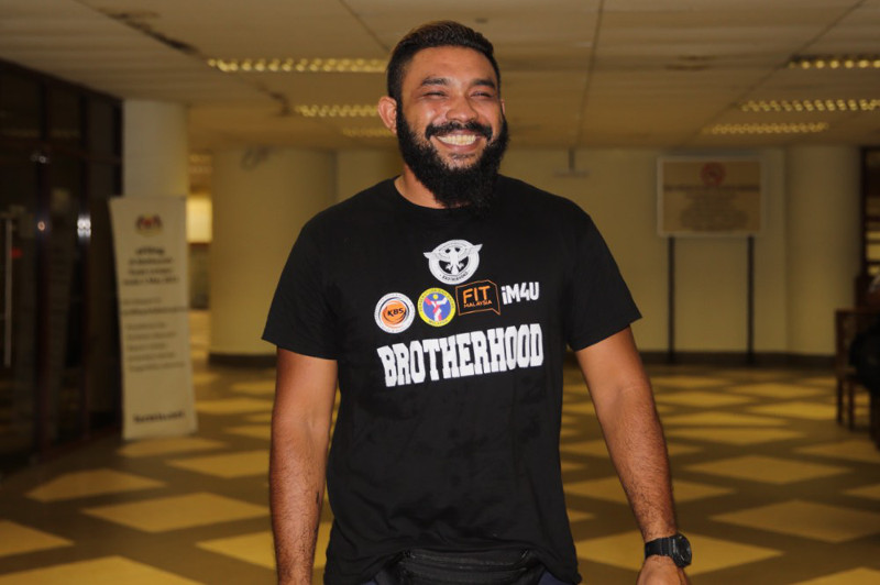 Wan Muhammad Azri Wan Deris (Papagomo) walks out of court after being fined RM4,300 for assaulting a foreign worker at the Jalan Duta Magistrates Court in Kuala Lumpur March 11, 2016. u00e2u20acu201d Picture by Choo Choy May