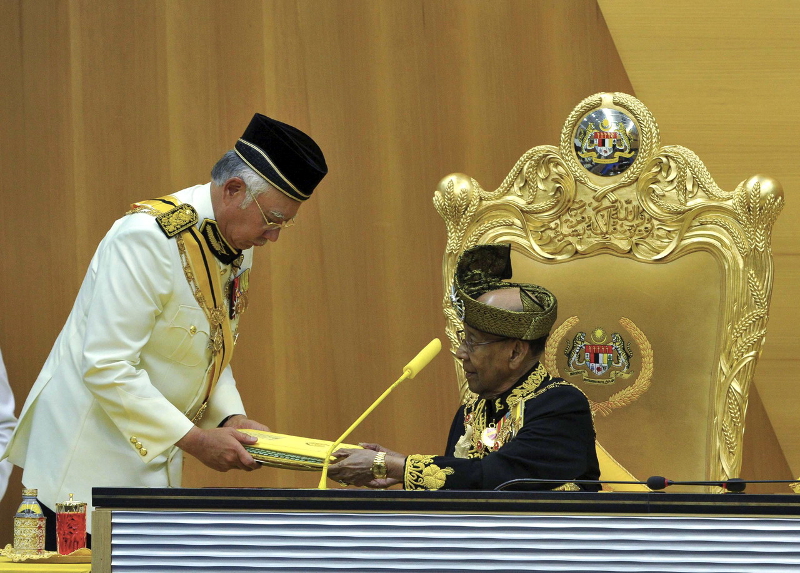 Yang di-Pertuan Agong Tuanku Abdul Halim Mu'adzam Shah receives the text of the royal address from Prime Minister Datuk Seri Najib Razak for the Opening of the first meeting of the Forth Session of the 13th Parliament in Kuala Lumpur, March 7, 2016. u00e2u20acu201d B