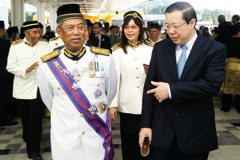 Tan Sri Muhyiddin Yassin (left) walks alongside Lim Guan Eng (right) to the Dewan Rakyat March 7, 2016. u00e2u20acu201d Picture courtesy of Edmund Teo