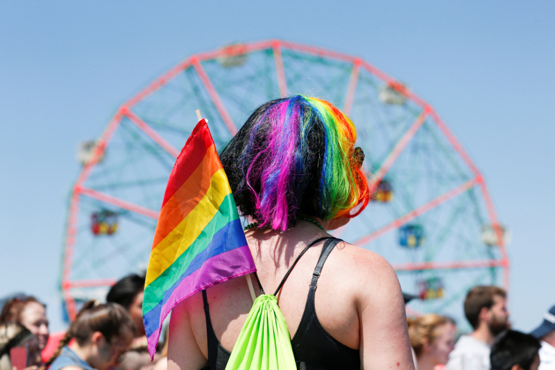 A participant wears a LGBT flag as people take part in the Annual Mermaid Parade in Brooklyn, New York, June 18, 2016. u00e2u20acu201d Reuters pic