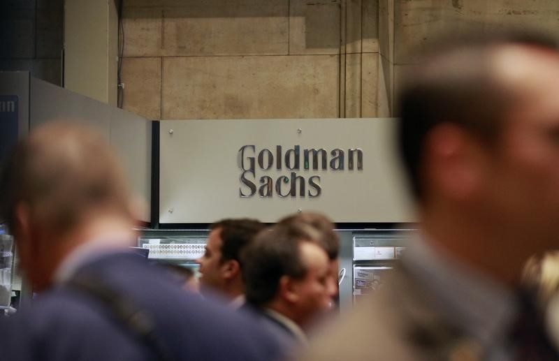 Traders work on the floor of the New York Stock Exchange near the Goldman Sachs stall July 16, 2010. u00e2u20acu201d Reuters pic