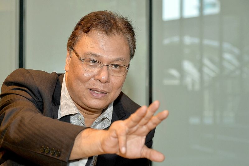 Finas director-general Datuk Kamil Othman wants local film-makers to look for their own investors. u00e2u20acu2022 Picture by Saw Siow Feng