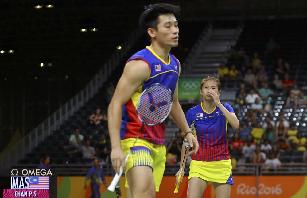 大马的陈炳顺与吴柳萤不敌印尼组合,无缘金牌。-路透社-