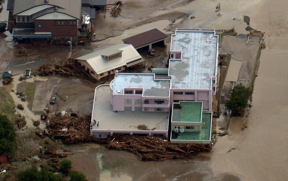 An aerial view shows a damaged home for the elderly caused by a flood triggered by Typhoon Lionrock, where local media say nine bodies were found, in Iwaizumi town, Iwate prefecture, Japan, in this photo taken by Kyodo, August 31, 2016. u00e2u20acu201d Reuters pic