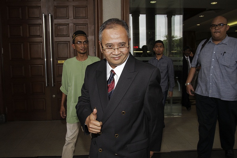 Muhammad Zahid Md Sarip is pictured after filing his application for leave for judicial review against the unconstitutionality of the Laporan Audit Negara to be classified as OSA outside the Kuala Lumpur High Court in Kuala Lumpur, Aug 5, 2016. u00e2u20acu201d Pictur