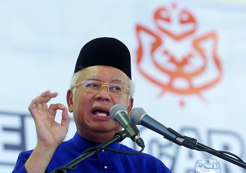 Prime Minister Datuk Seri Najib Razak speaks during the simultaneous delegates meeting of all Selangor Umno divisions at Mara, in Sepang Aug 6, 2016. u00e2u20acu201d Bernama pic