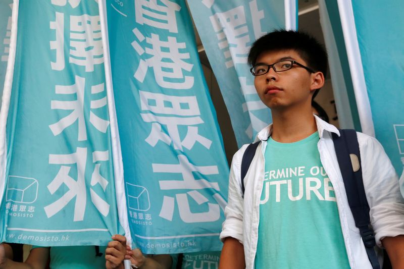 Student leader Joshua Wong looks on before a verdict, on charges of inciting and participating in an illegal assembly in 2014, outside a court in Hong Kong July 21, 2016. u00e2u20acu201d Reuters pic 