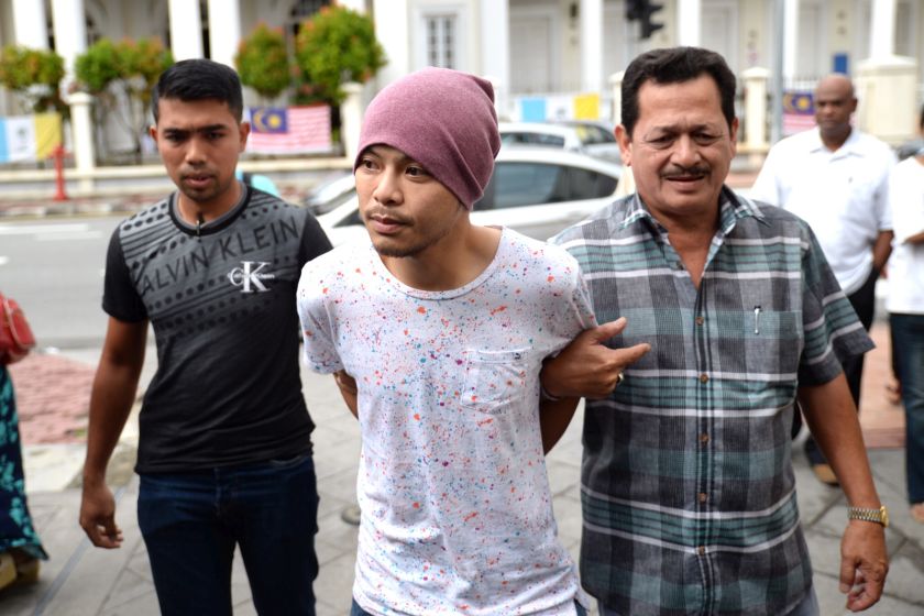 Namawee is brought to the Magistrate Court for remand this morning, August 22, 2016. u00e2u20acu201d Photo by KE Ooi