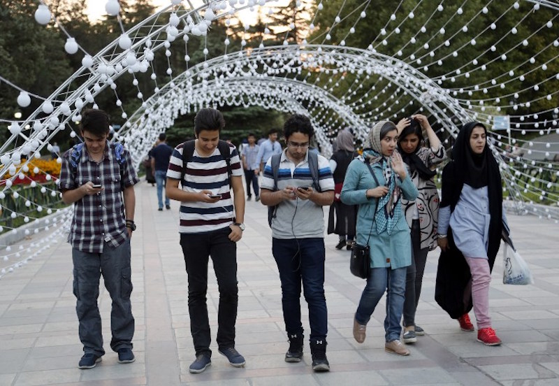 Iranians play on the u00e2u20acu02dcPokemon Gou00e2u20acu2122 app in northern Tehranu00e2u20acu2122s Mellat Park on August 3, 2016. u00e2u20acu201d AFP pic