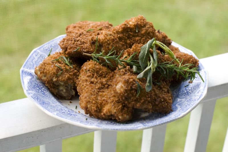 In this image taken on June 3, 2013, the best fried chicken you'll ever eat at home is shown served on a plate in Concord, N.H. (AP Photo/Matthew Mead)n