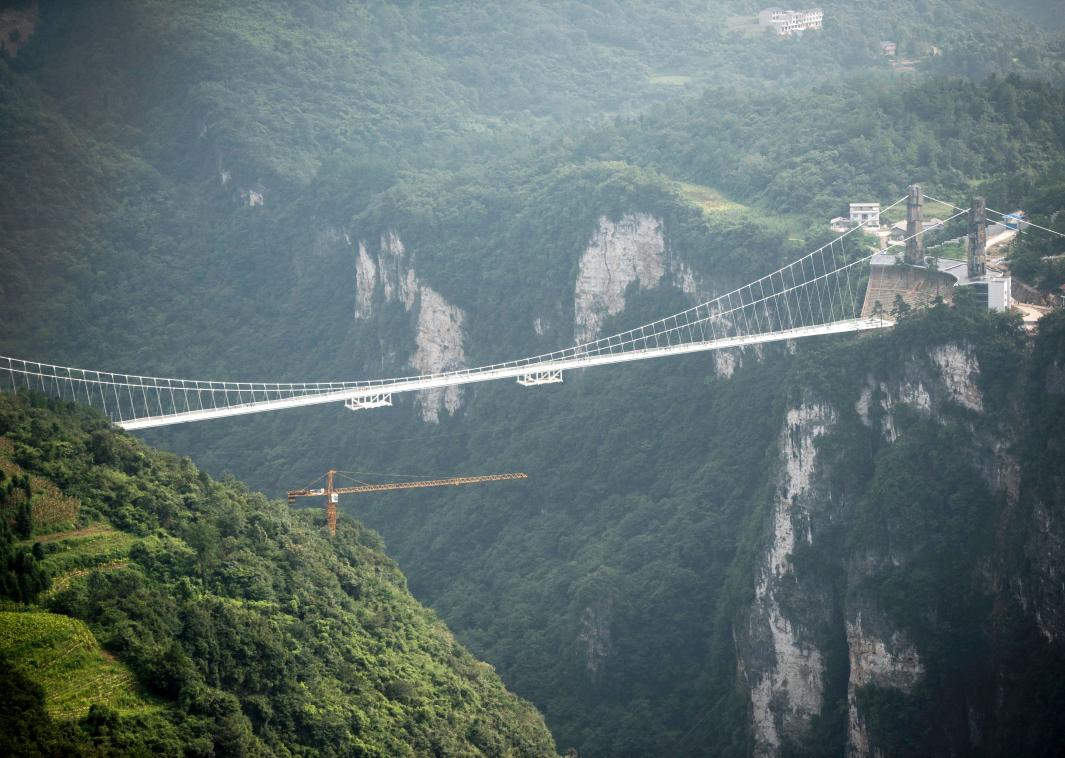 The worldu00e2u20acu2122s highest and longest glass-bottomed bridge in Chinau00e2u20acu2122s Hunan Province.-pic via AFPn
