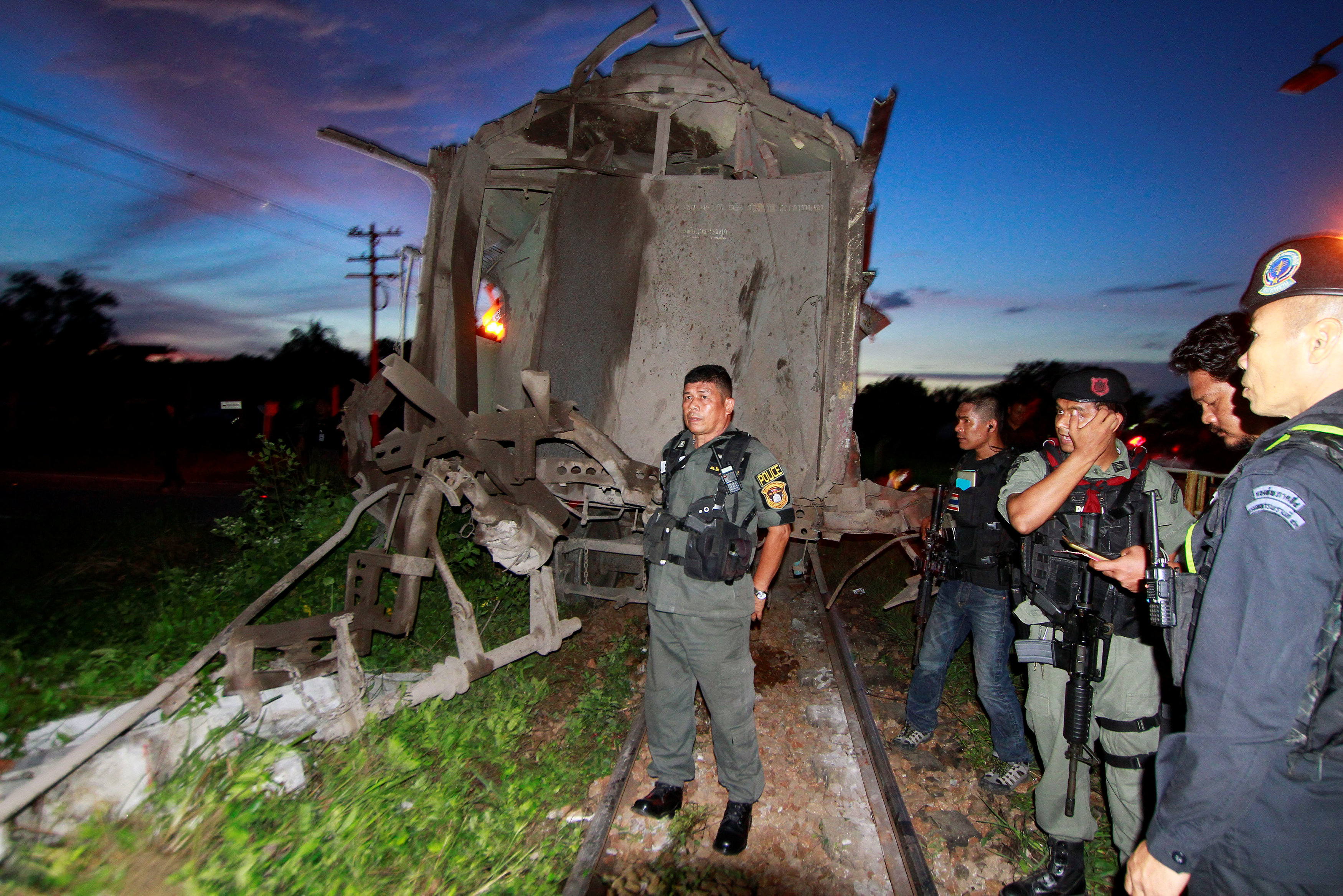 Military personnel inspect the site of a bomb attack at Khok Pho district in the troubled southern province of Pattani, Thailand, September 3, 2016. REUTERS/Surapan Boonthanom TPX IMAGES OF THE DAYn